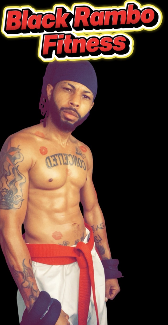 Black Rambo Fitness founder in a red-belt gi